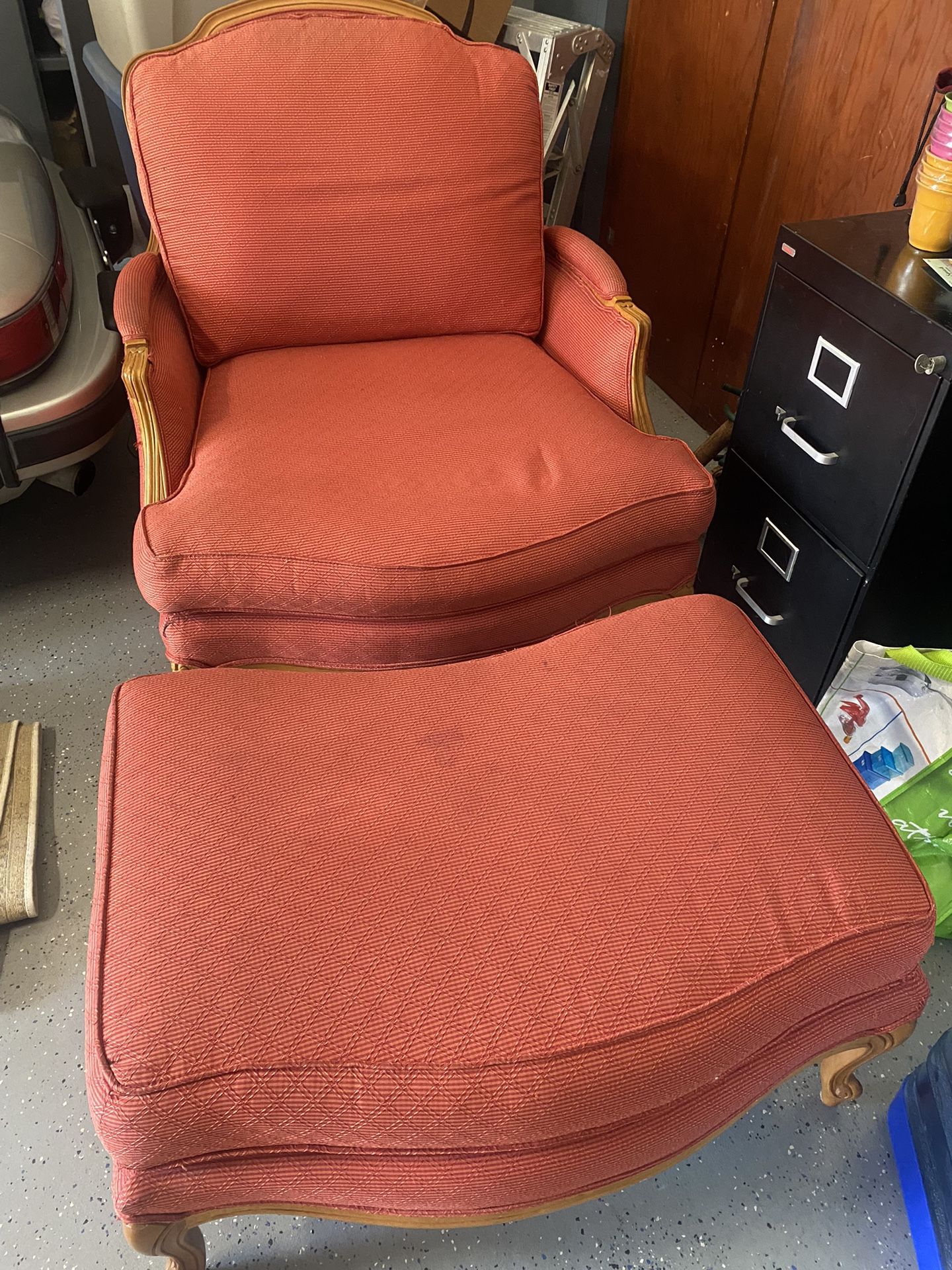 Upholsters Chair And Ottoman 