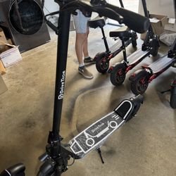 Long-lasting electric scooter with shock absorption