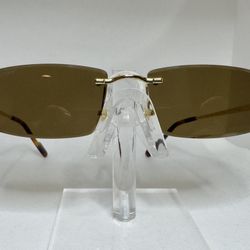 Cartier  Rimless Eyeglasses – $99