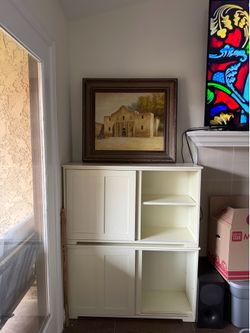 2 off white sliding cabinets