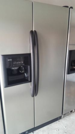 refrigerator brand Kenmore measures 35 wide and 70 high 2 months warranty delivery and installation