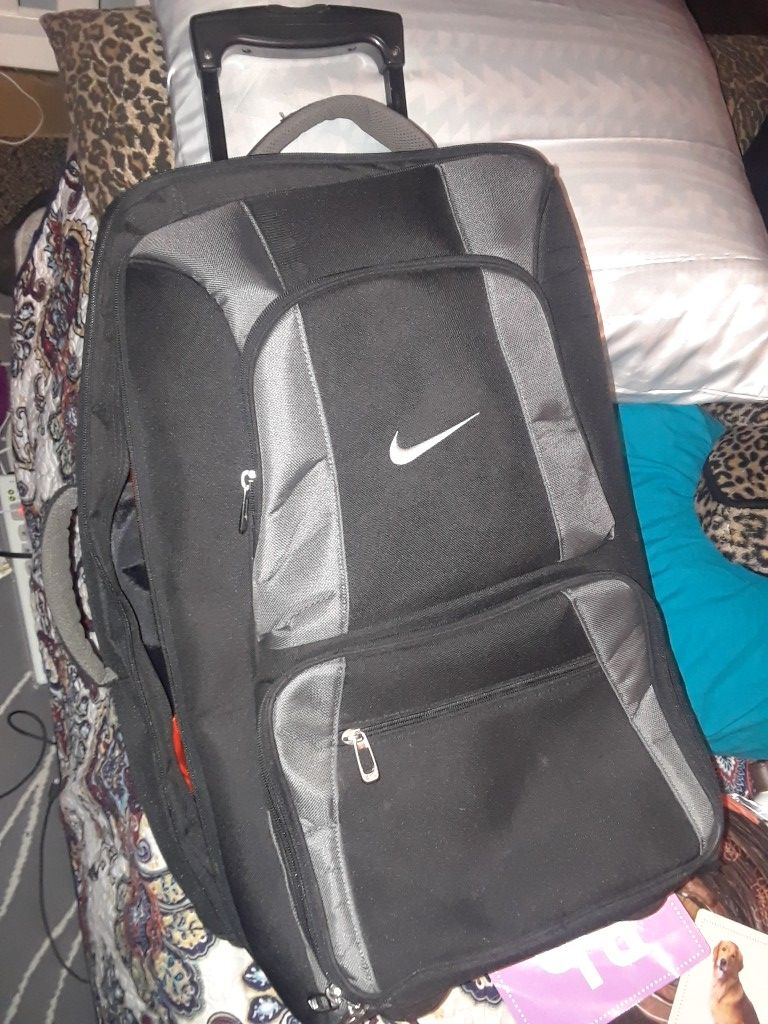 Nike rolling suitcase
