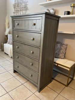 Tall dresser, solid woood, 50” tall, 34” Good condition