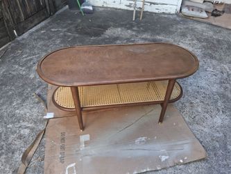 Oval Wood Coffee Table with Cane Shelf