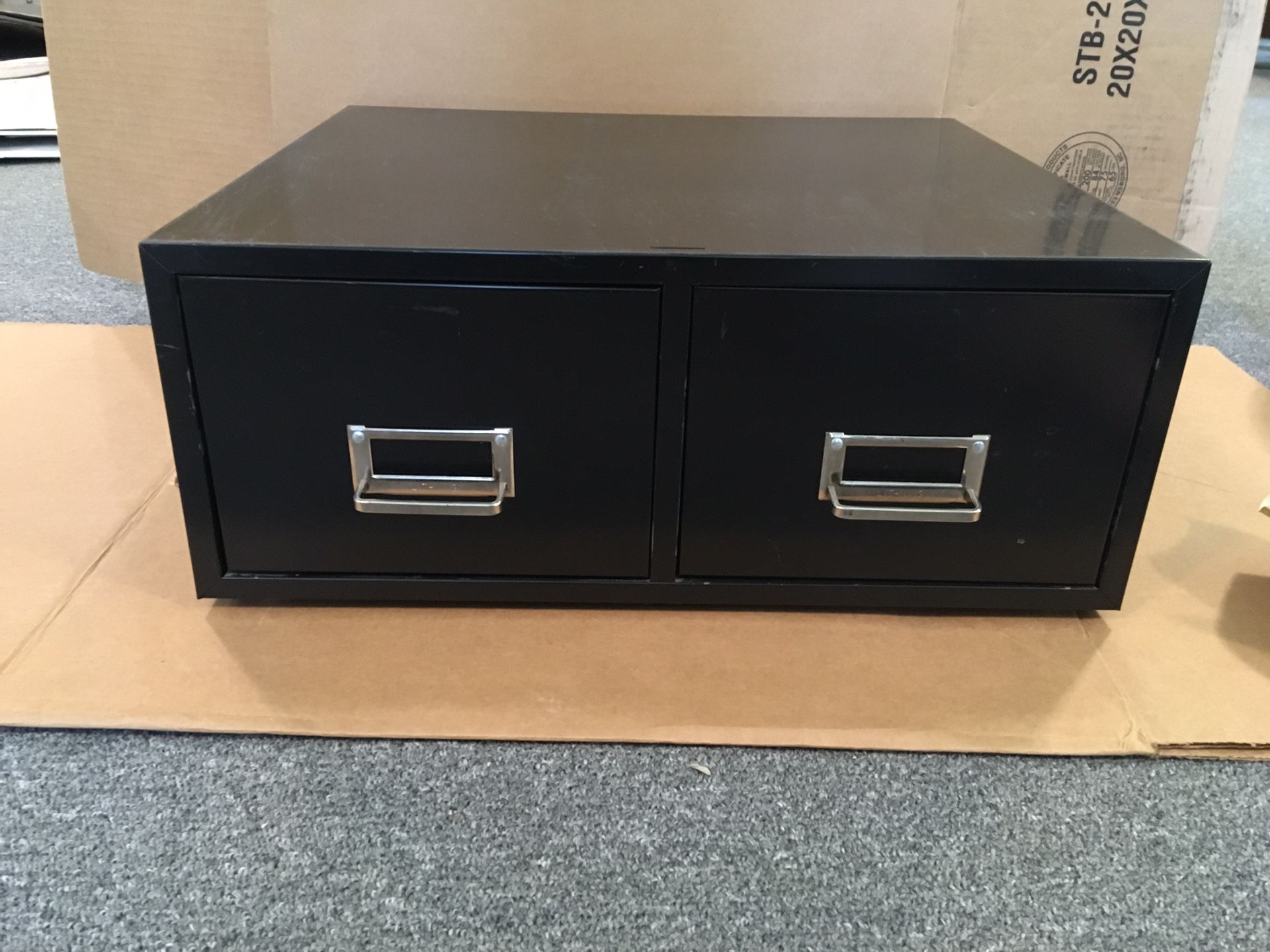 Metal desk top or shelf file cabinet. Overall dimensions are 18.25” wide, 7.25” tall and 16” deep. Dimensions of the drawers are 8.25” wide, 6” tall