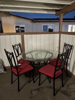 Clear Glass Table with Red Polka Dot Chairs