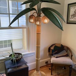 Wicker floor lamp in the shape of a palm tree designed by Mario Lopez Torres. Mexico, circa 1970s.  Mid Century   Height 78" Diameter 45"