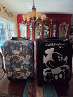 2 Disney suitcases