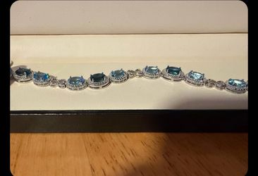 Blue Topaz and Diamond Halo Tennis Bracelet