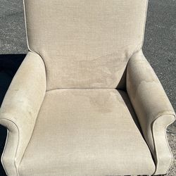 Fabric arm Chair 41 in height x 18.5 in seat height x 23.5in arm height x 25 in depth. Beige, wooden legs, water stains. 