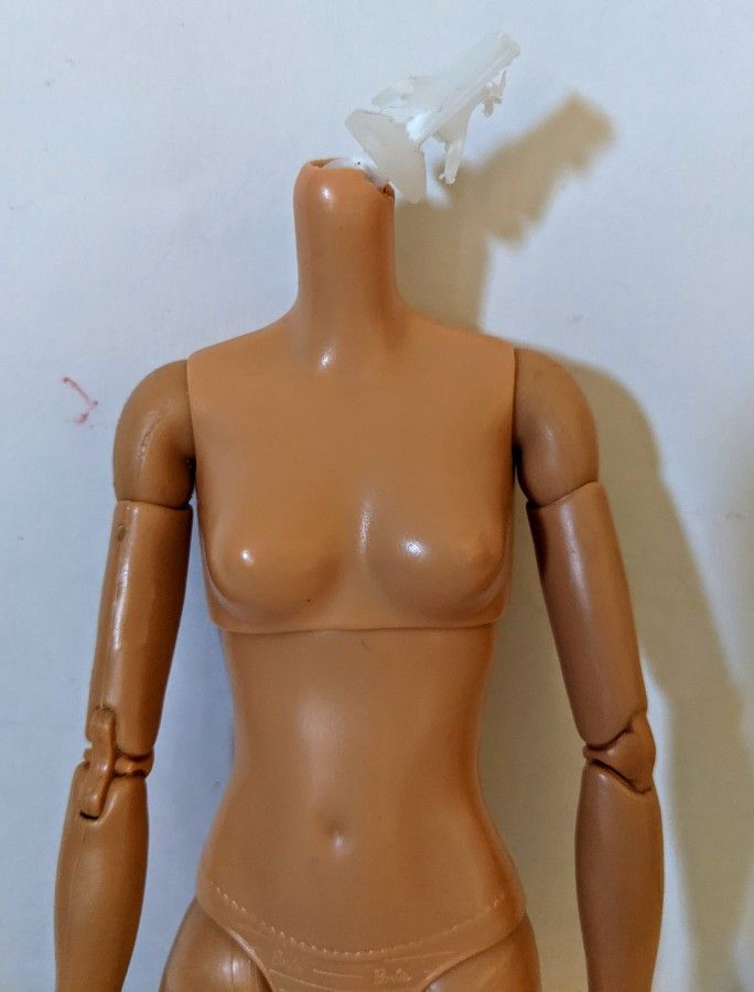 Made To Move Barbie Doll Body Only Slightly Damaged.