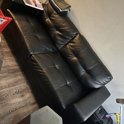 New/Used Black leather couches 