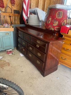 It is solid seven drawers cherry dresser