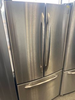 Ge stainless steel french door refrigerator , 33" wide  -free delivery