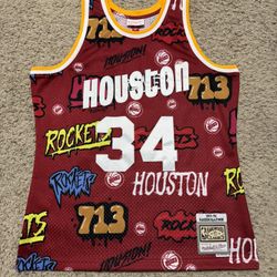 93-94 Hakeem Olajuwon #34 Rockets Mens Mitchell & Ness Swingman Slap Jersey