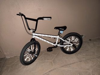 Elite bmx (wheelie bike) with a lot of accessories (can trade)