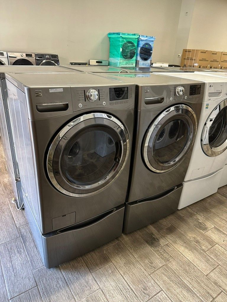 Kenmore elite stainless steel Frontload washer and dryer set electric with warranty