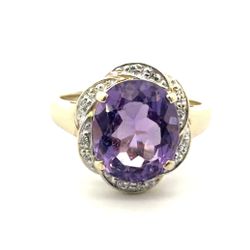 Woman’s Ladies 10k Yellow Gold Diamond and Oval Purple Stone Ring Size 9 GP3131322