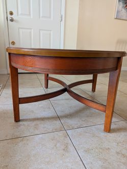 Oval wooden coffee table