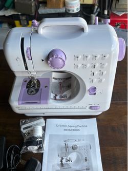 12-Stitch Portable Sewing Compact sewing machine with 12 built-in stitch patterns. This white Machine