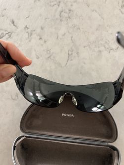Prada. MEn Women Sunglasses Black With Red. $95 Obo