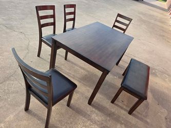Dining table with 4 chairs and bench