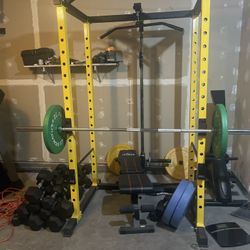 Squat Rack/ Rouge Assault Bike/rouge/dumbbell’s/ Rowing Machine  