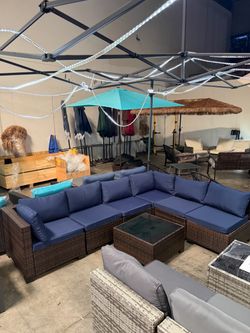 MOVING SALE!! Assemble d 7 individual pcs great for your patio space!! In Brown/Navy blue cushions!!