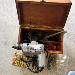 Black and decker reverseable 3/8 scru-drill. Cat no 681 complete with box and drill bits.  