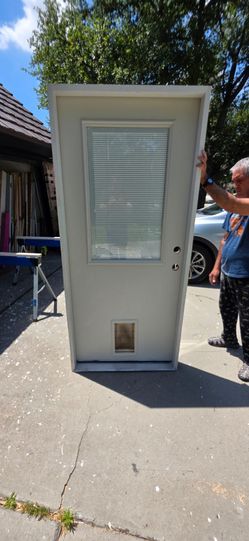 36x80 back doogy door metal. With miniblinds. Framed , ready to install