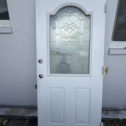 Front door. White and glass