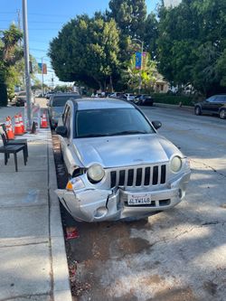 Jeep Compass Silver SUV — Front End Damage