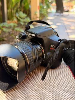 Canon EOS Rebel T7 DSLR Camera + Canon 24-85mm USM Lens + Hood