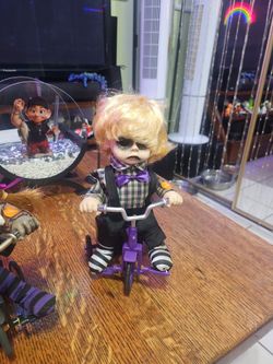 Spooky Village Animated Bicycle Doll