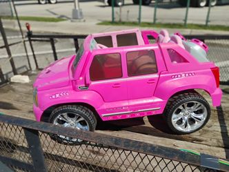 Two-seater Cadillac Escalade ride rightt now $30  delivery available