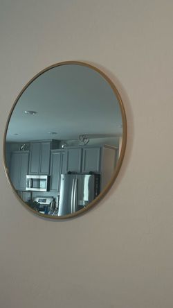 Round big mirror, golden frame