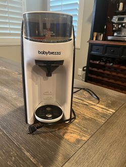 Baby Brezza Formula Advanced with funnels
