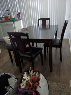 Dining room table 3 chairs and a bench