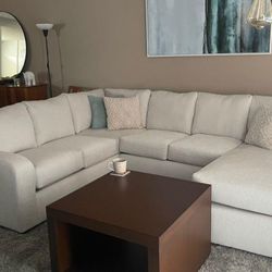 Colby  Microfiber White Sectional And Coffee Table 