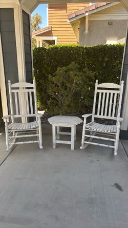 wood rocking chairs and table