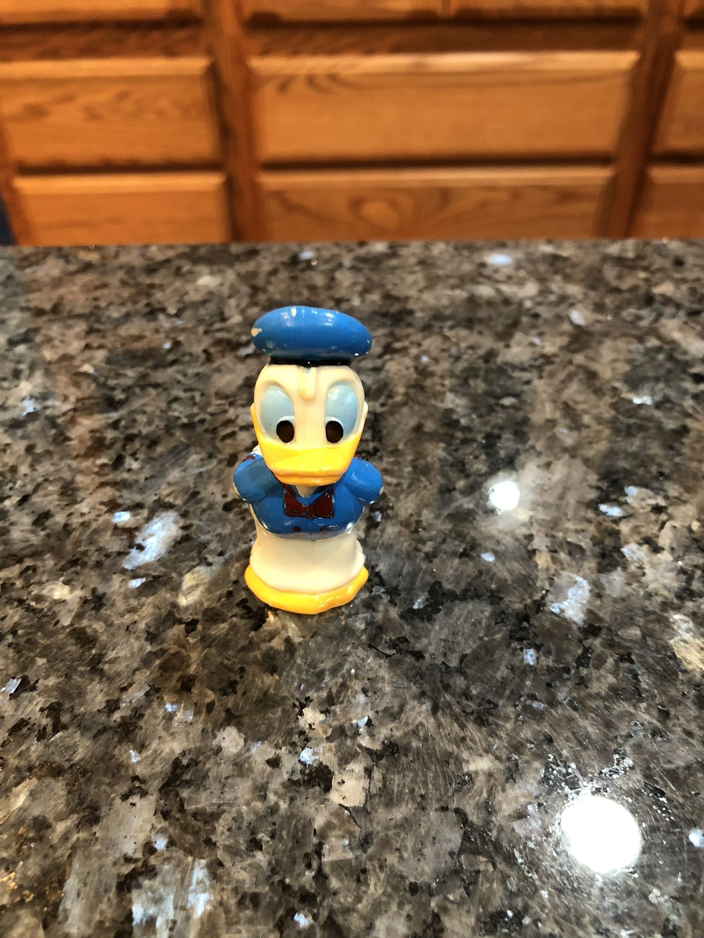 Toy Vintage Disney Donald Duck Rubber Figure. Size 2 1/4 inches tall and 1 inches wide. Preowned has minor paint wear due to age. See pictures.