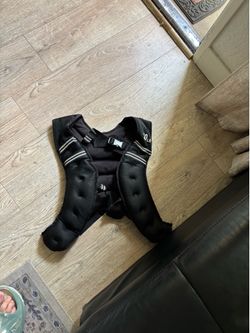 Weight vest 30 lb and kettlebell 53 lb.View the description below