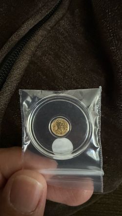 Small Gold Coin in Protective Capsule