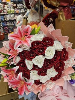 Colorful bouquets available! These have different types like red roses, pink lilies, bright sunflowers, and some cool crochet flowers. Also got a supe