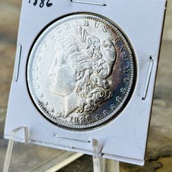 Uncirculated 1886 Morgan Silver Dollar Coin Toned