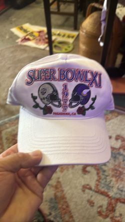 a '47 Brand white "Hitch" adjustable cap featuring embroidered dueling helmets for Super Bowl XI.