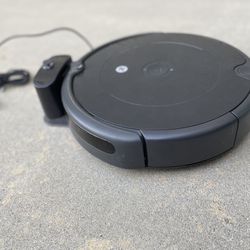 iRobot 694 Self Charging Robotic Roomba Vacuum