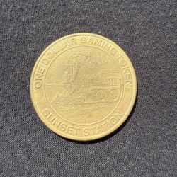 Sunset station one dollar gaming token, 1997