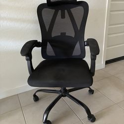 Black ergonomic mesh office chair