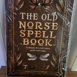 Vintage "The Old Norse Spell Book" Metal Sign